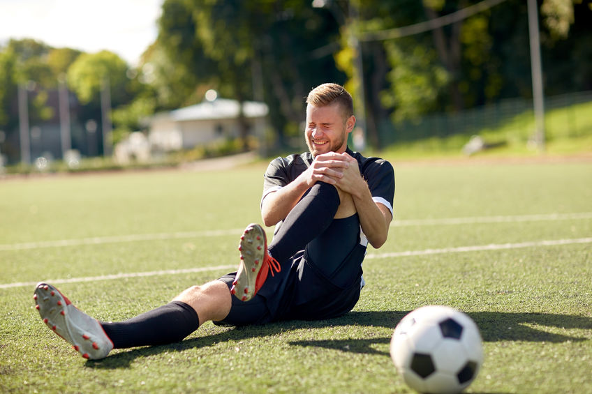 soccer player with knee injury